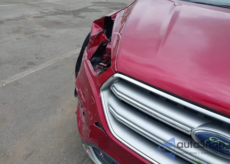 2017 Ford Escape Titanium z USA, uszkodzony, nr VIN 1FMCU0J97HUE84151